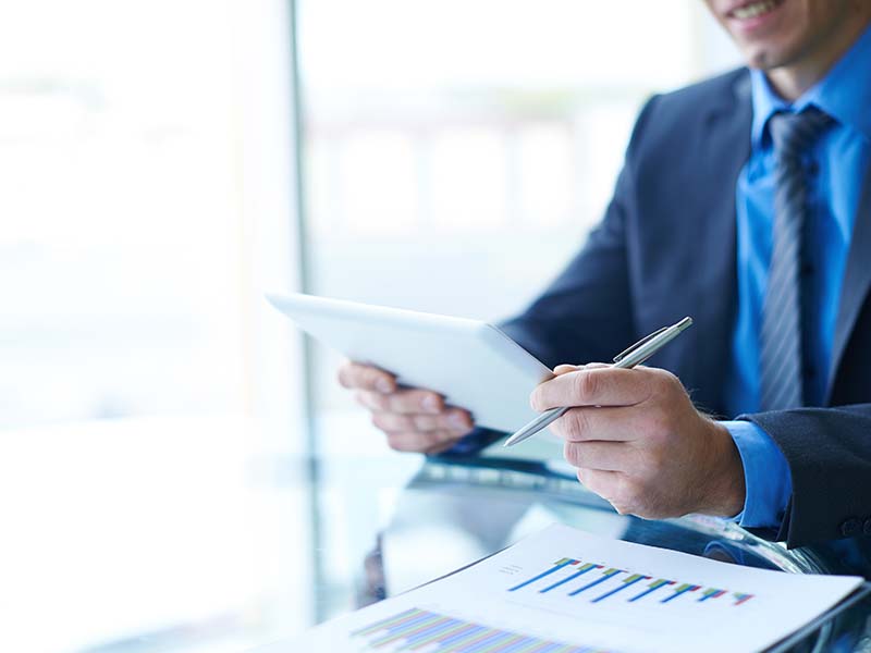 businessman-looking-tablet